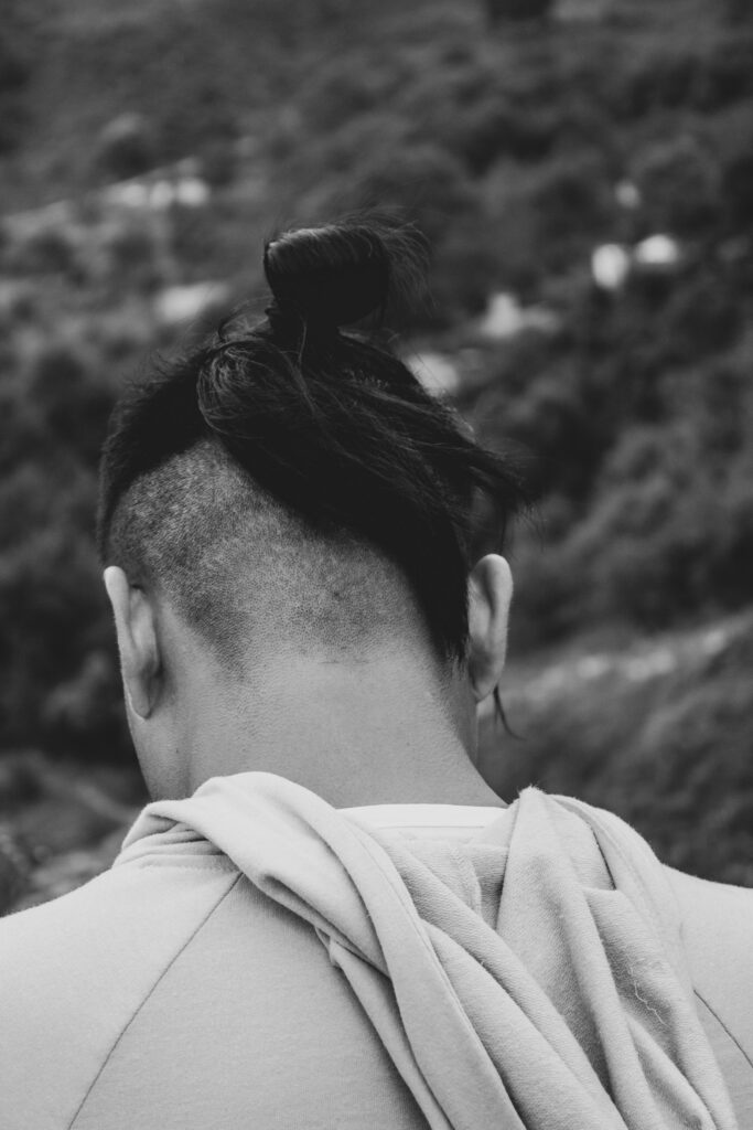 Sleek Middle-Part Low Bun